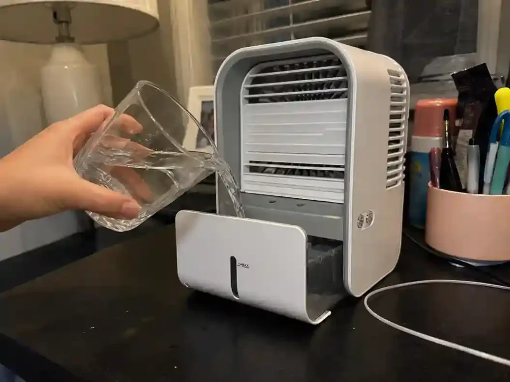 Filling the Frost Cooler personal cooling device water reservoir