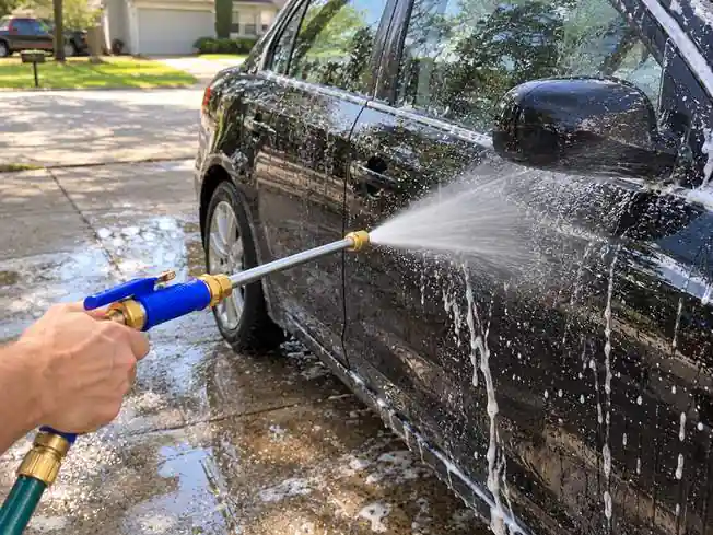 JetStrike Water Hose cleaning car