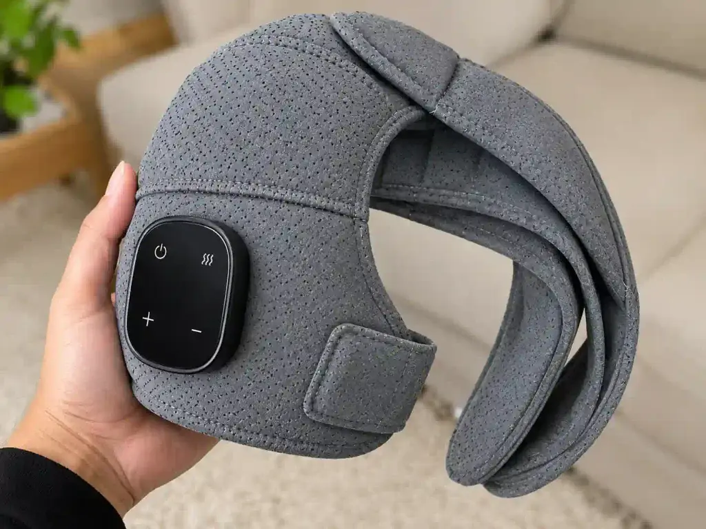 shoulder massager in hand